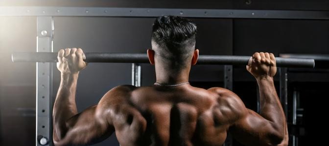 Man doing grip pull ups
